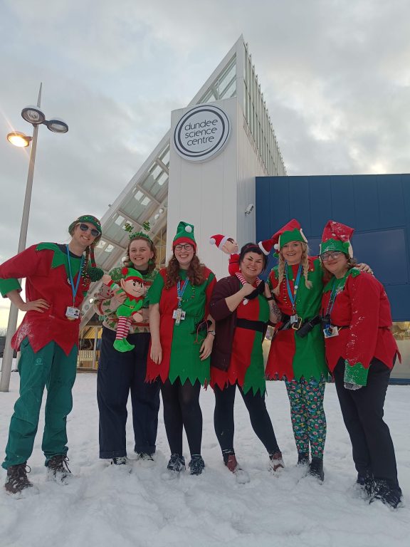 Staff dressed as elves outside Dundee Science Centre