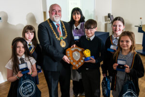 The winner and the 5 runners up of the Exhibit Competition stand beside the Lord Provost holding their Stem Inspiration Awards.