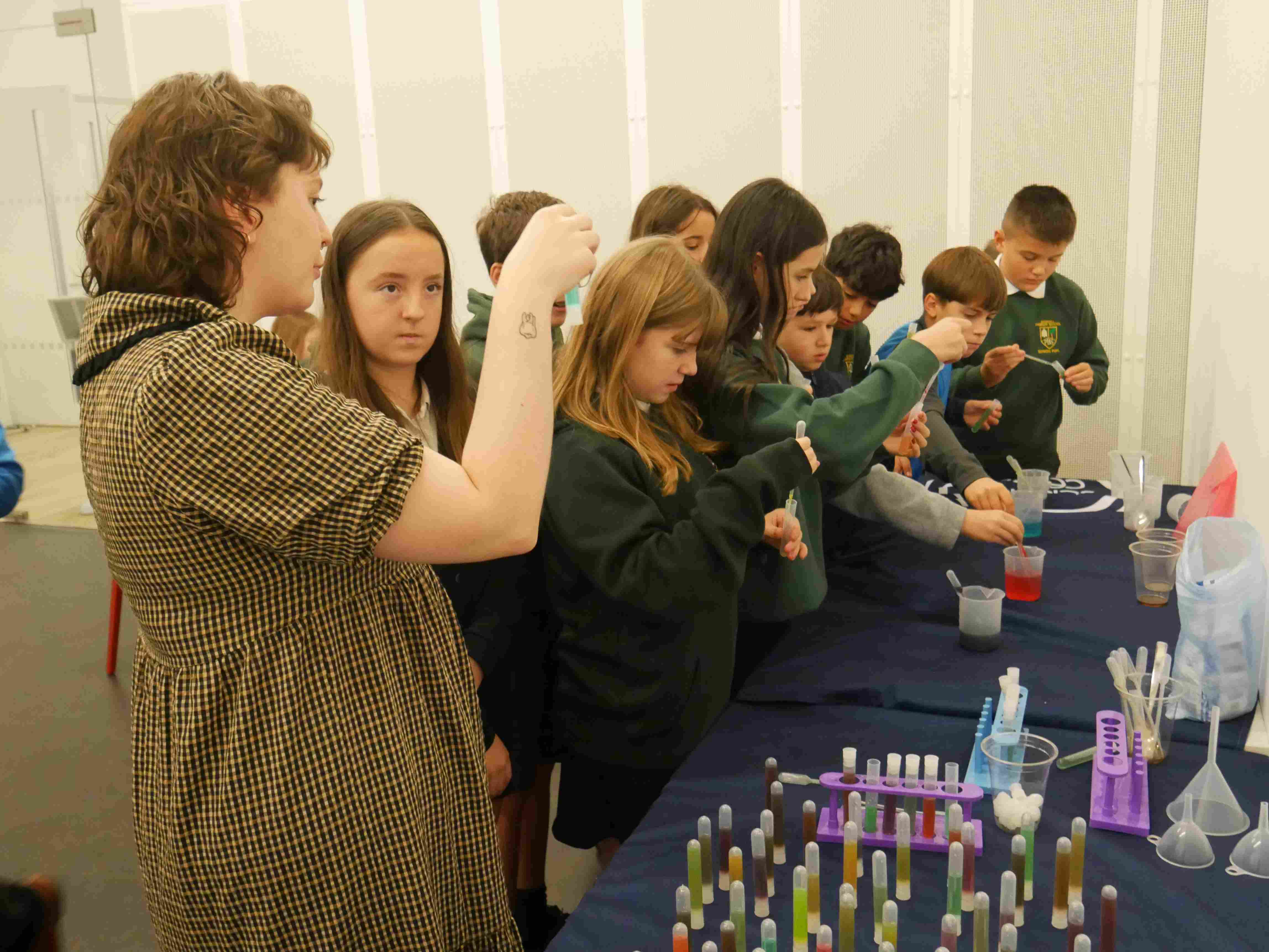 Schoolchildren taking part in Tartan science activities